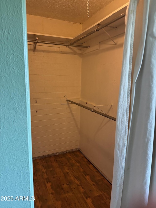 5363 N Black Canyon Highway, Phoenix, AZ 85015 - walk in closet featuring dark wood-style flooring