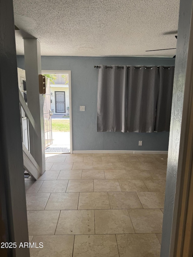 5363 N Black Canyon Highway, Phoenix, AZ 85015 - empty room featuring baseboards and a textured ceiling
