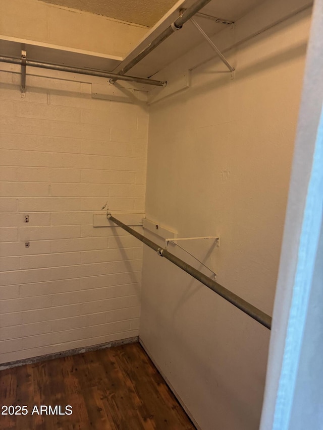 5363 N Black Canyon Highway, Phoenix, AZ 85015 - walk in closet with dark wood-style flooring