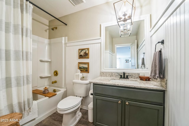 full bathroom featuring toilet, vanity, wood-type flooring, and shower / bath combo