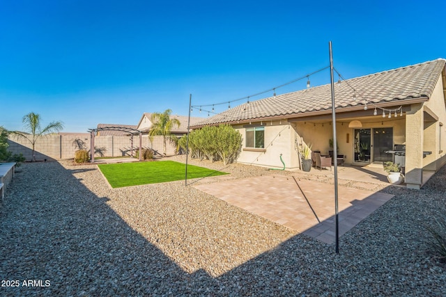 view of yard with a pergola and a patio area