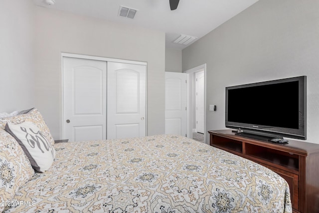 bedroom featuring visible vents, a closet, and ceiling fan
