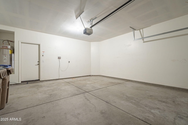 garage with electric water heater and a garage door opener