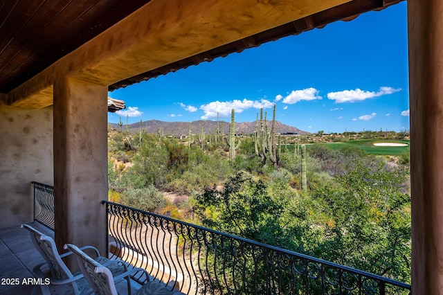 balcony featuring a mountain view