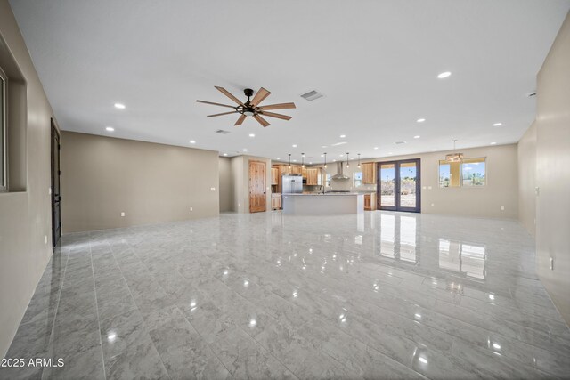 115 Ironwood Pl, Wickenburg, AZ 85390 - unfurnished living room with visible vents, recessed lighting, and ceiling fan