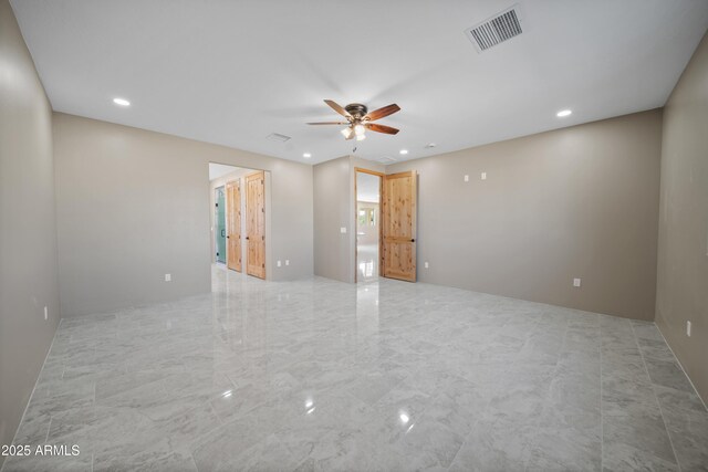 115 Ironwood Pl, Wickenburg, AZ 85390 - unfurnished room featuring recessed lighting, visible vents, marble finish floor, and a ceiling fan