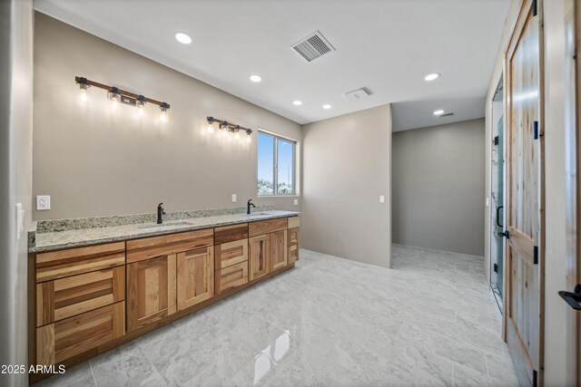 115 Ironwood Pl, Wickenburg, AZ 85390 - bathroom with visible vents, a sink, recessed lighting, and double vanity