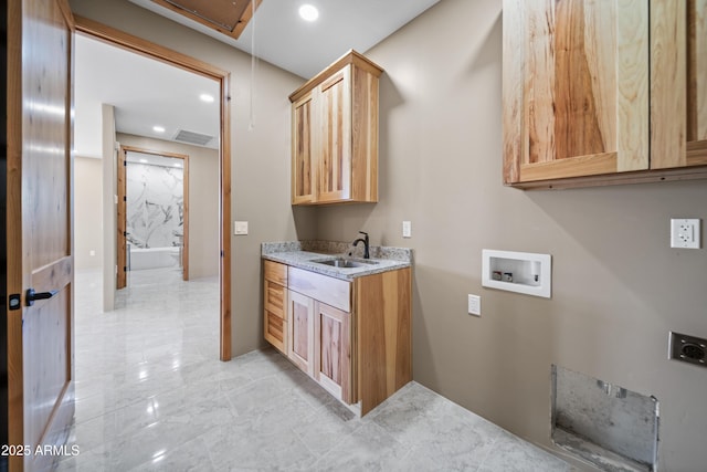 115 Ironwood Pl, Wickenburg, AZ 85390 - washroom featuring hookup for a washing machine, a sink, attic access, hookup for an electric dryer, and cabinet space