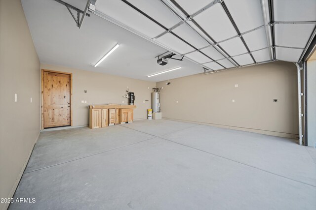 115 Ironwood Pl, Wickenburg, AZ 85390 - garage with water heater and a garage door opener