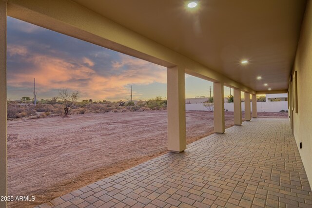 115 Ironwood Pl, Wickenburg, AZ 85390 - patio terrace at dusk featuring fence