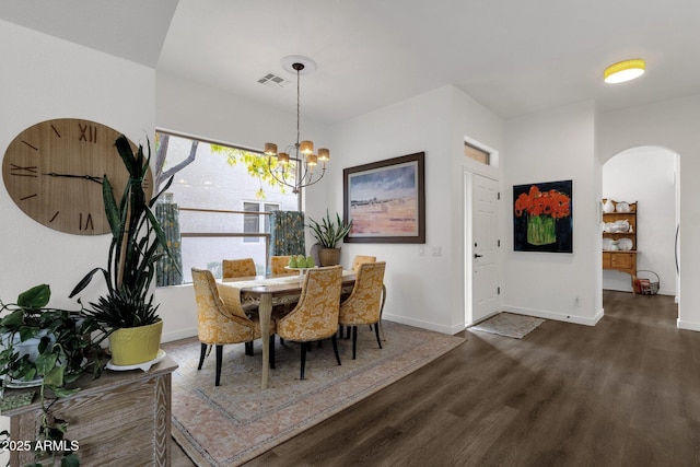 23705 S Pleasant Way, Sun Lakes, AZ 85248 - dining room featuring visible vents, arched walkways, wood finished floors, baseboards, and a chandelier