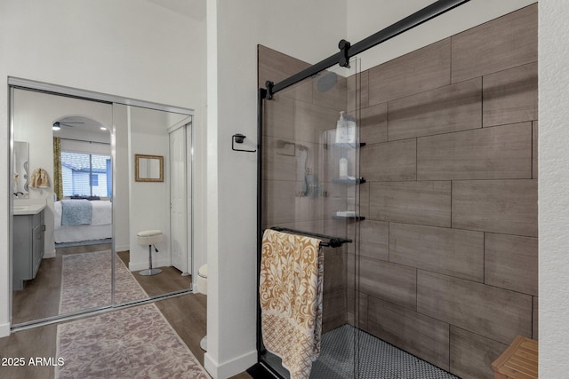 23705 S Pleasant Way, Sun Lakes, AZ 85248 - full bath with a shower stall, wood finished floors, baseboards, toilet, and connected bathroom