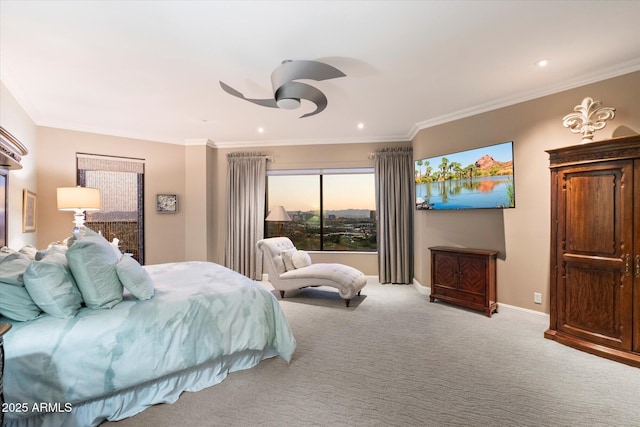 carpeted bedroom featuring recessed lighting, baseboards, ornamental molding, and a ceiling fan