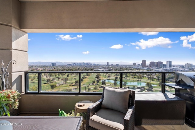 balcony featuring a view of city