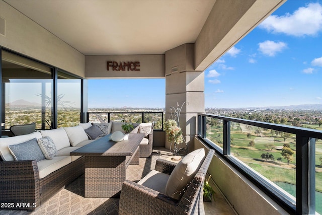 balcony with an outdoor hangout area