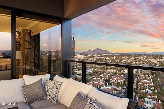 balcony featuring a mountain view