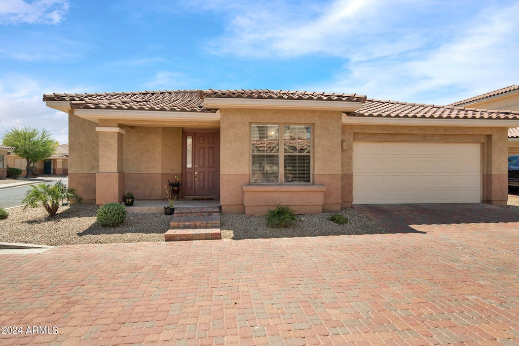 view of front of home with a garage