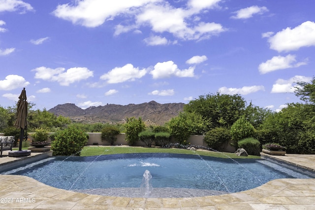 view of swimming pool featuring a mountain view and pool water feature