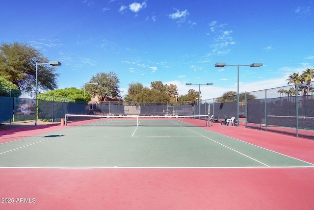 view of tennis court with basketball court