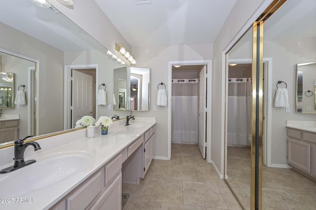 bathroom with vanity and tile patterned floors