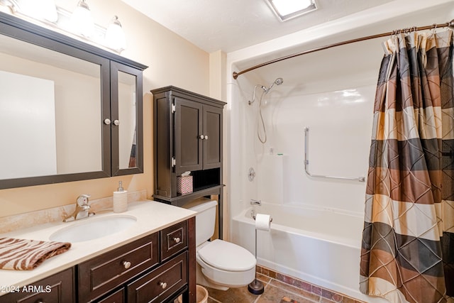 full bathroom with vanity, shower / bathtub combination with curtain, and toilet