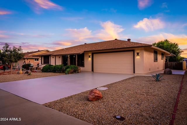 single story home with a garage