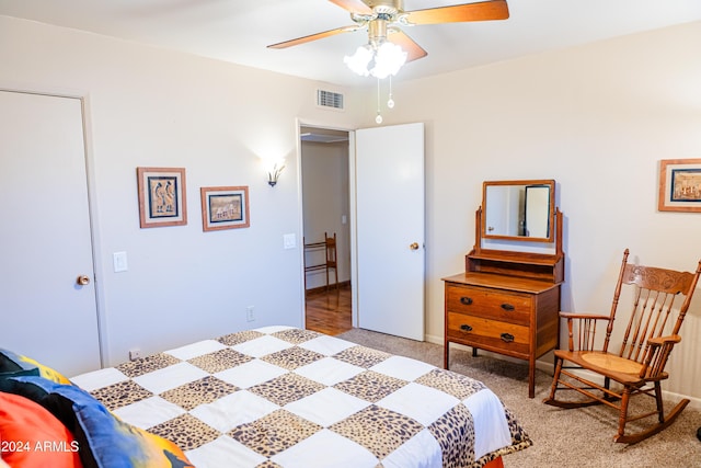 bedroom with ceiling fan and carpet