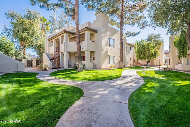 exterior space featuring a front yard