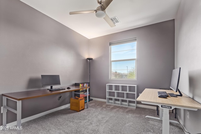 home office featuring carpet flooring and ceiling fan