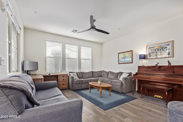 living room with ceiling fan