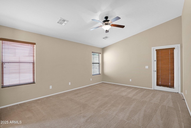 2620 E Rustling Oaks Ln, Phoenix, AZ 85024 - unfurnished room featuring lofted ceiling, a ceiling fan, baseboards, and light carpet