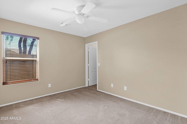 2620 E Rustling Oaks Ln, Phoenix, AZ 85024 - carpeted empty room featuring baseboards and ceiling fan