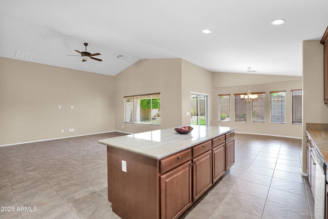 2620 E Rustling Oaks Ln, Phoenix, AZ 85024 - kitchen with lofted ceiling, plenty of natural light, open floor plan, a chandelier, and a kitchen island