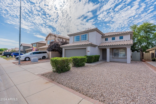 view of front of property featuring a garage