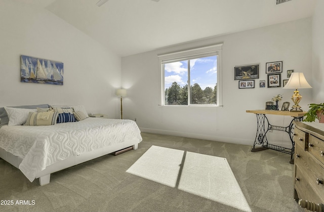bedroom featuring baseboards, visible vents, carpet, and lofted ceiling