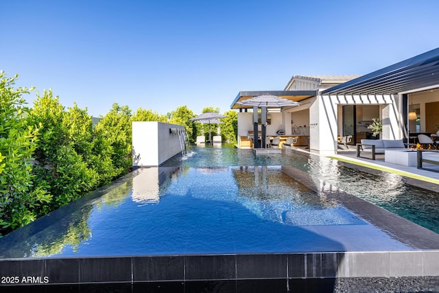 3684 E Boot Track Trl, Gilbert, AZ 85296 - view of pool with an infinity pool and a patio