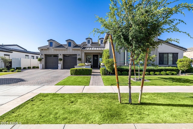 3684 E Boot Track Trl, Gilbert, AZ 85296 - view of front of house featuring a garage, decorative driveway, a front lawn, and stucco siding