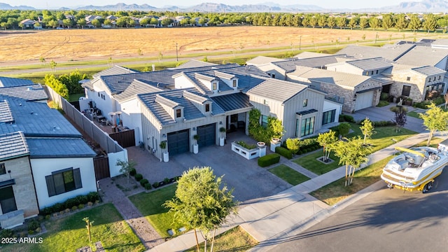 3684 E Boot Track Trl, Gilbert, AZ 85296 - aerial perspective of suburban area with a mountainous background
