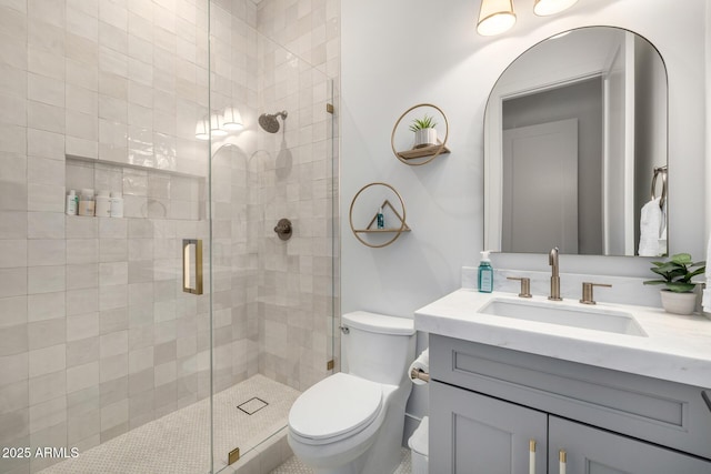 3684 E Boot Track Trl, Gilbert, AZ 85296 - bathroom with vanity, toilet, and a stall shower