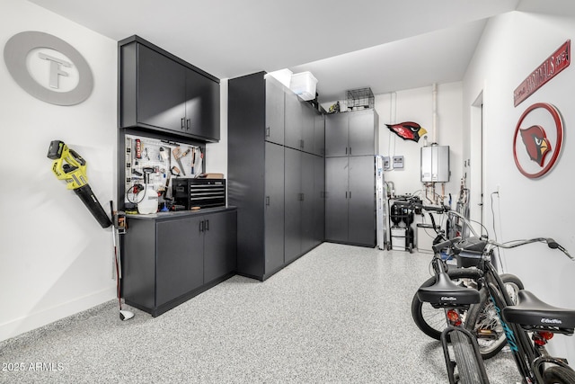 3684 E Boot Track Trl, Gilbert, AZ 85296 - exercise area with tankless water heater and baseboards