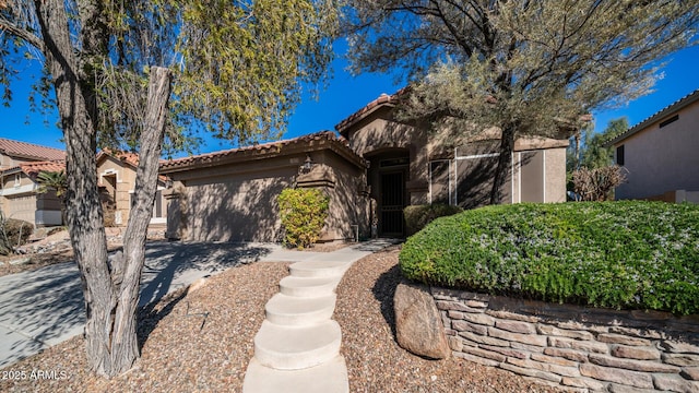 view of front of property featuring a garage