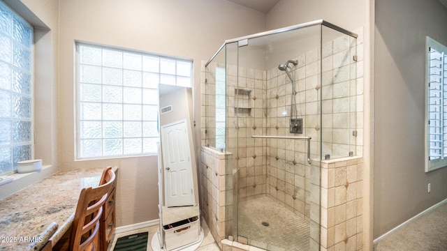 bathroom with an enclosed shower