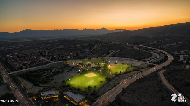 aerial view at dusk with a mountain view