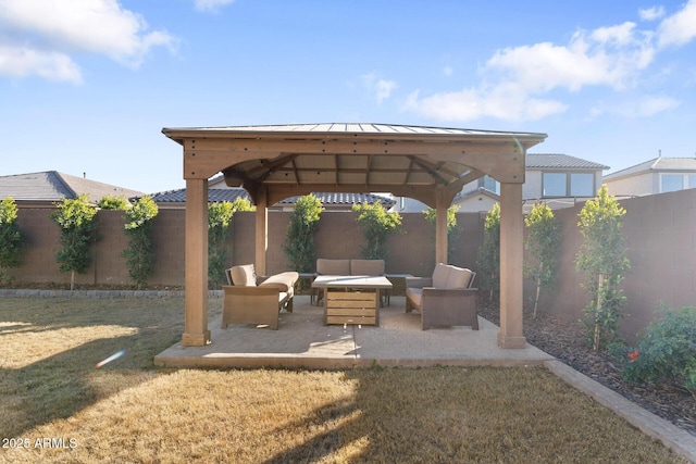 view of patio featuring an outdoor living space and a gazebo