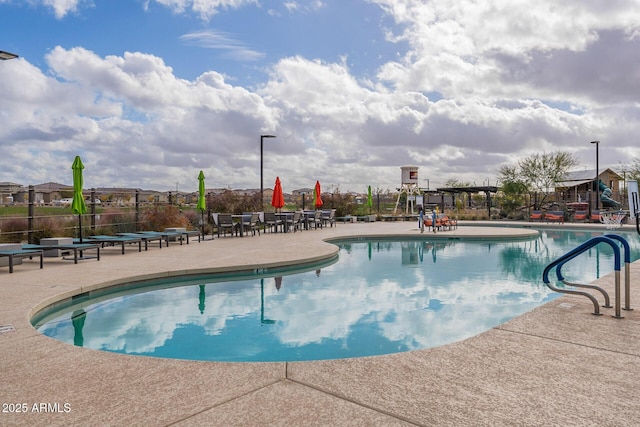 view of pool with a patio