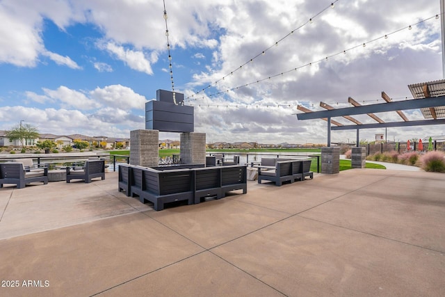 view of patio / terrace featuring an outdoor living space and a pergola