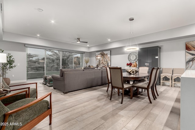 dining area featuring recessed lighting and light wood-type flooring