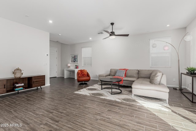 living area with recessed lighting, visible vents, wood tiled floor, ceiling fan, and baseboards