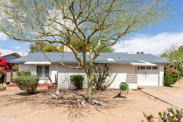 ranch-style house with a garage