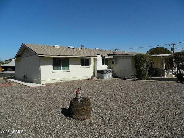 single story home featuring cooling unit